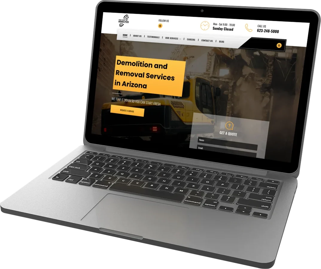 First Step Demolition website built by Kickass, shown on a laptop
